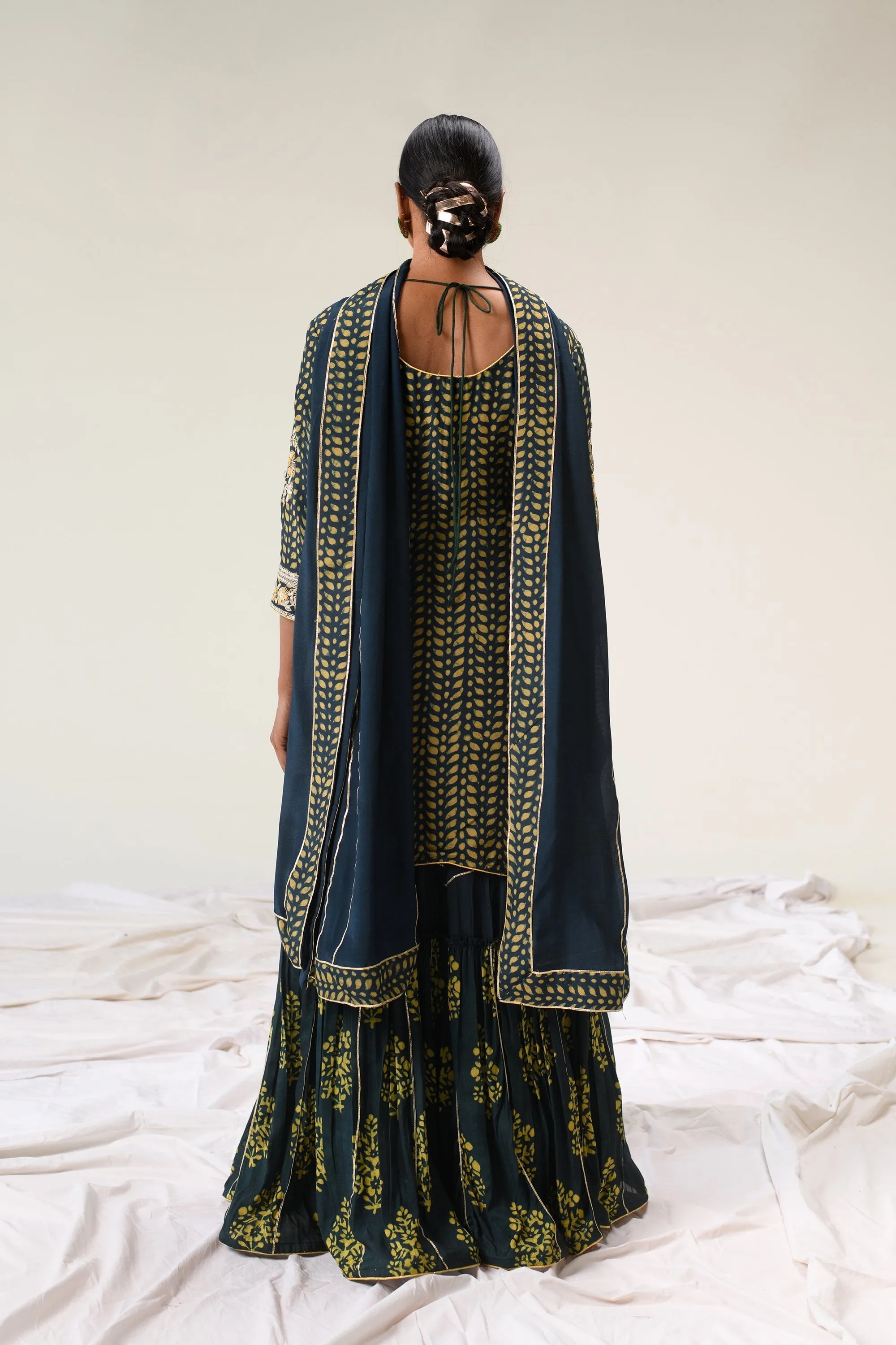 Cotton Silk Dabu Print Suit with Hand Aari work.